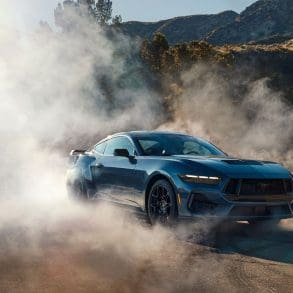 angled view of mustang doing burnout